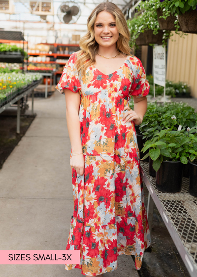Red floral dress with short sleeves and tiered skirt
