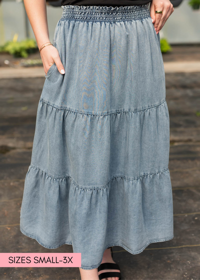 Pocket on a denim blue tiered skirt