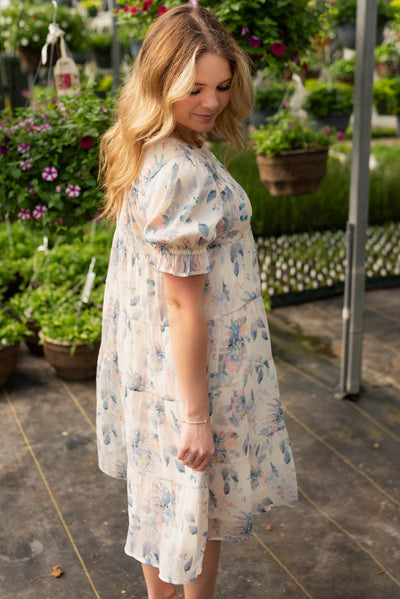 Side view of the blue floral puff sleeve dress