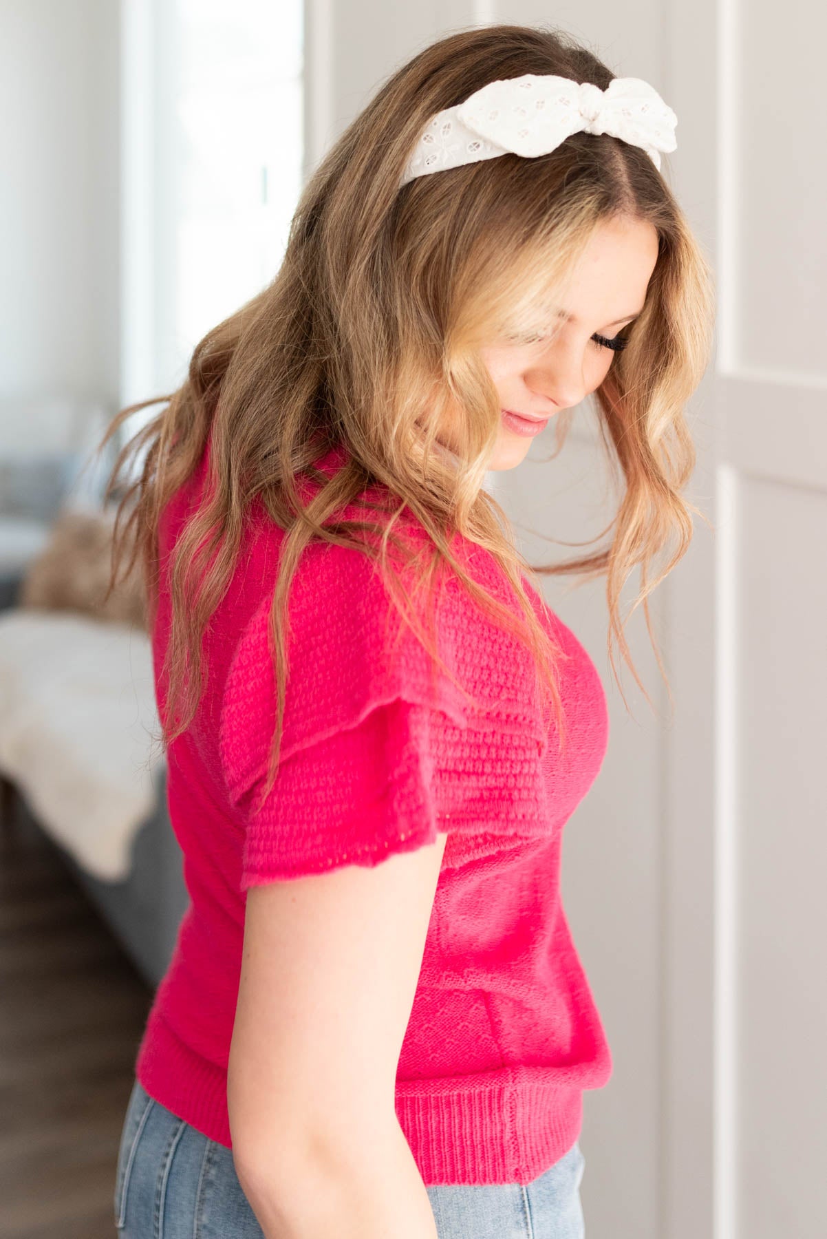 Side view of the fuchsia sweater top