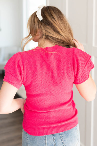 Back view of the fuchsia sweater top