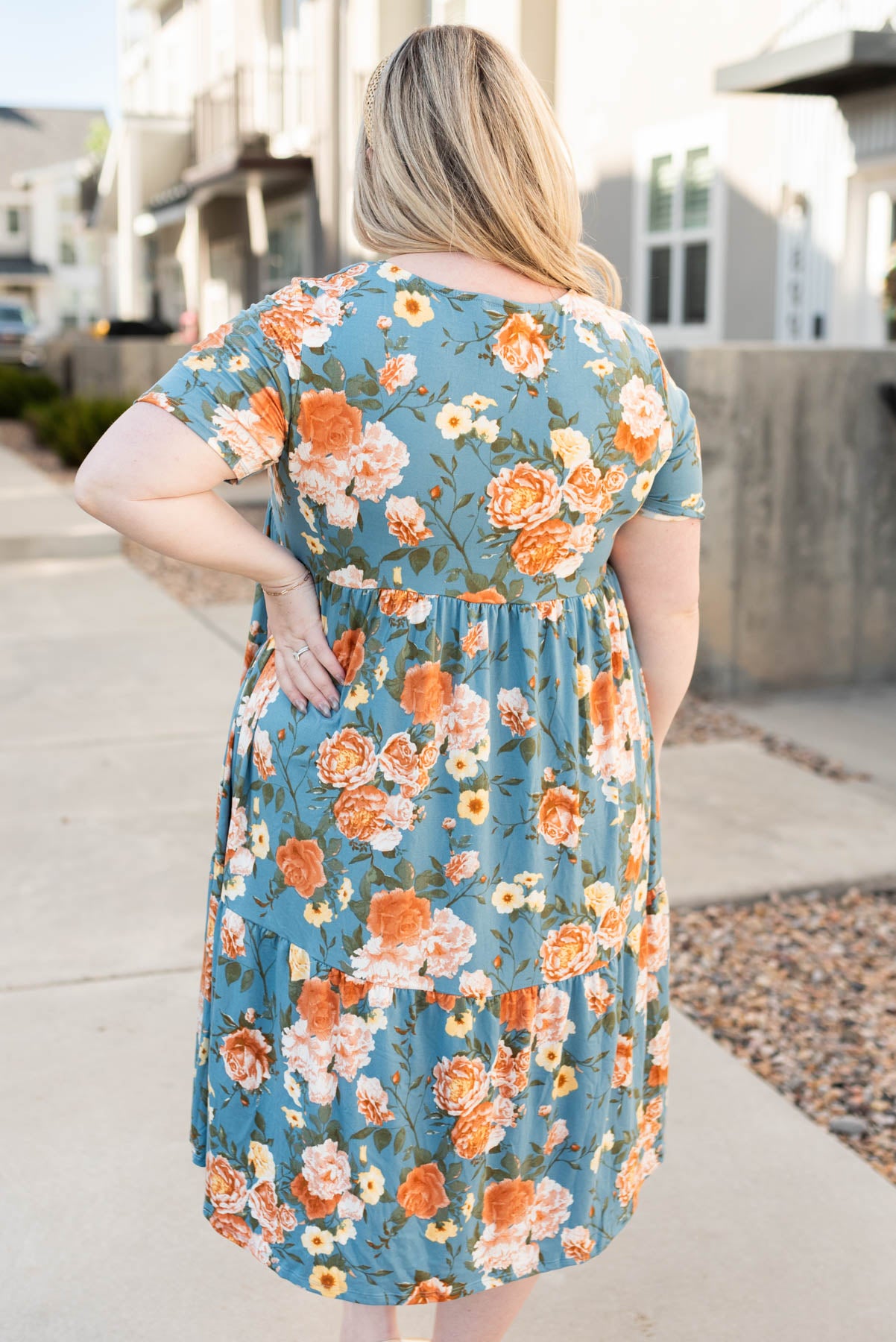 Back view of the plus size denim tiered dress