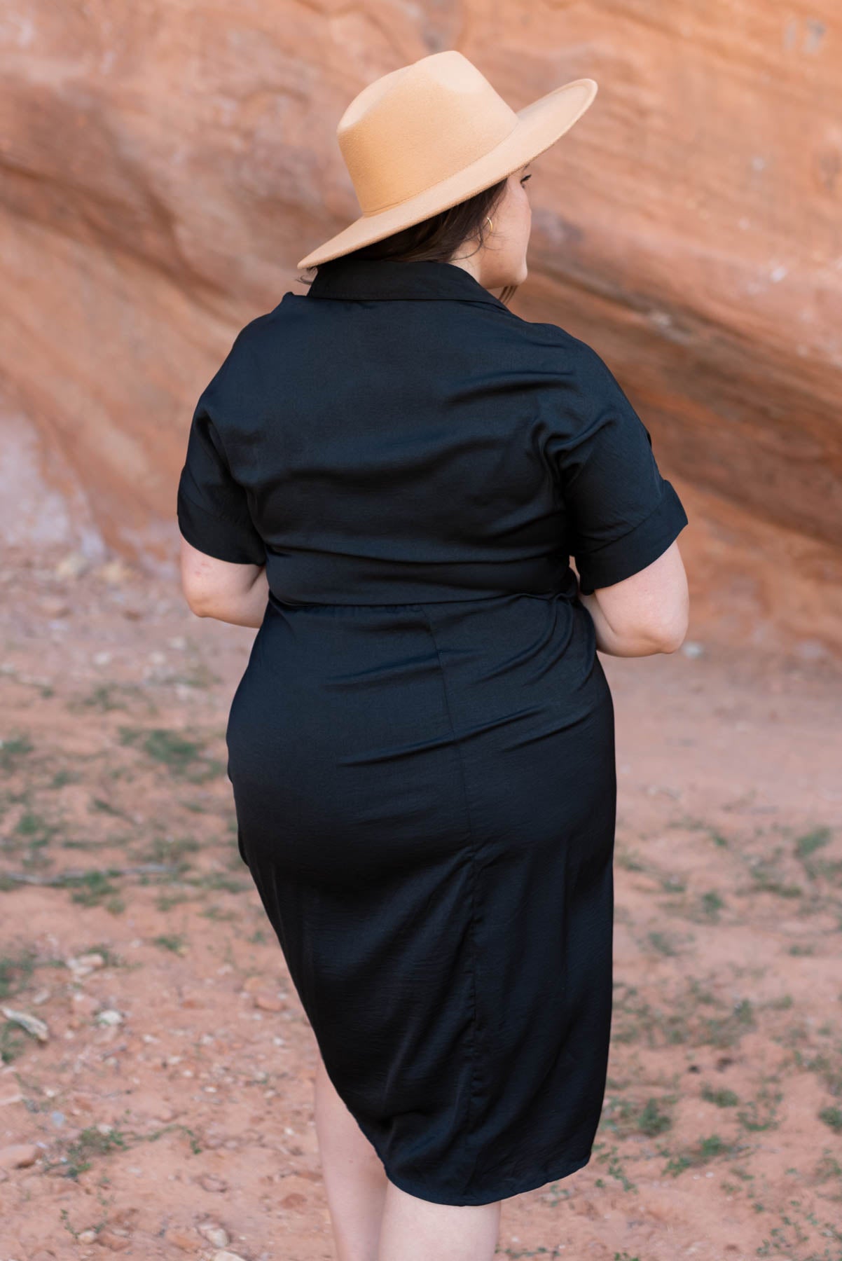 Back view of a plus size black dress