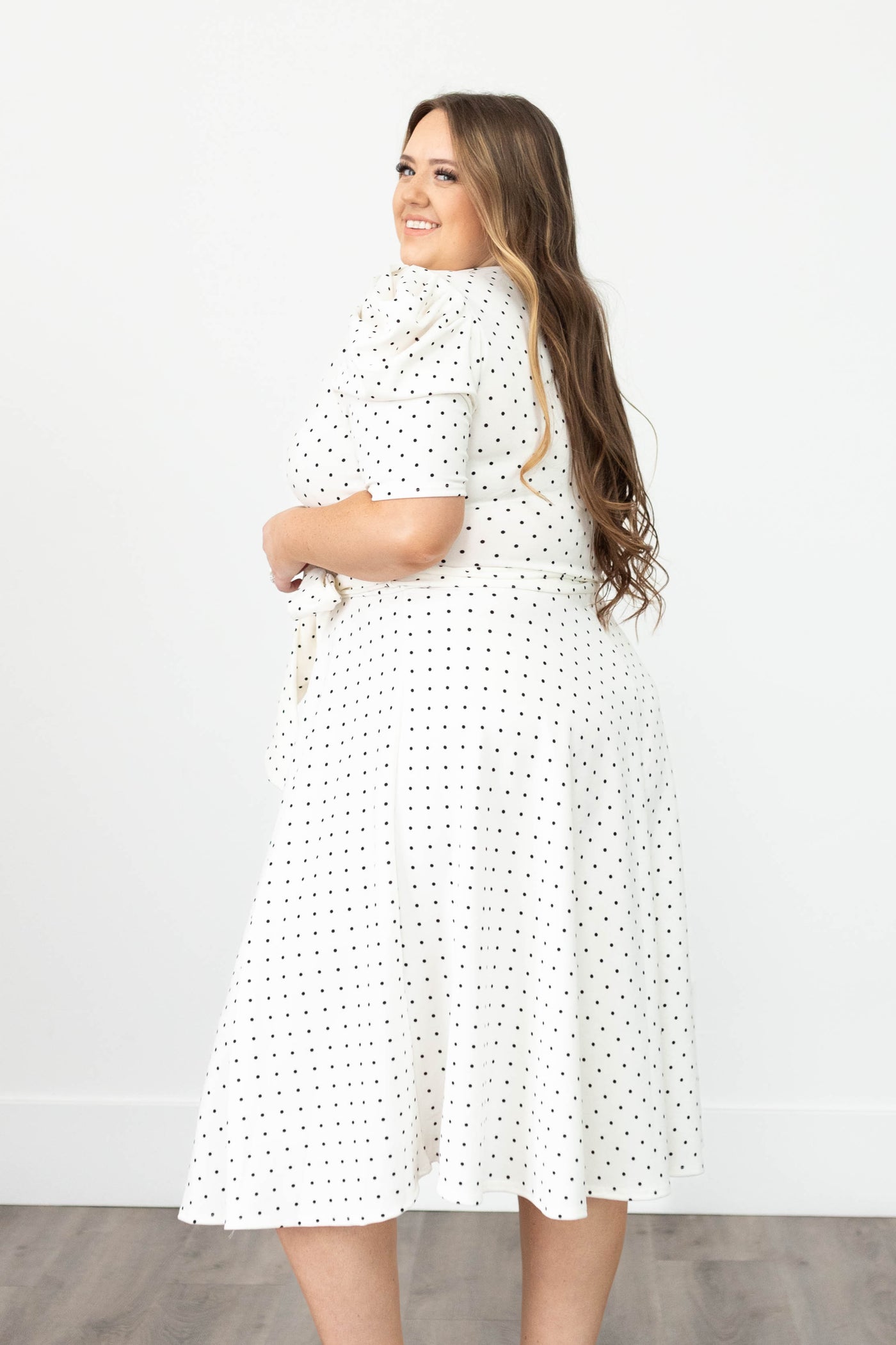 Side view of a white dot dress