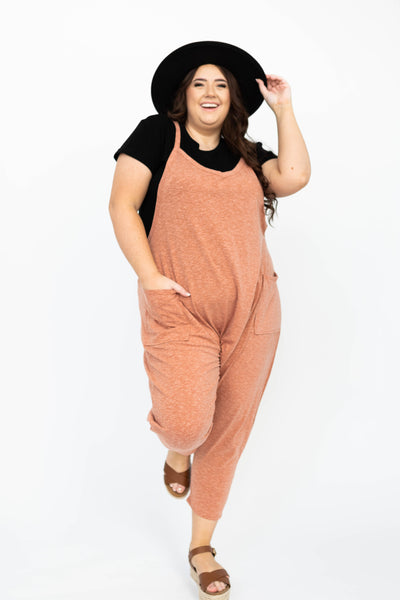 Plus size rust jumpsuit with tapered legs