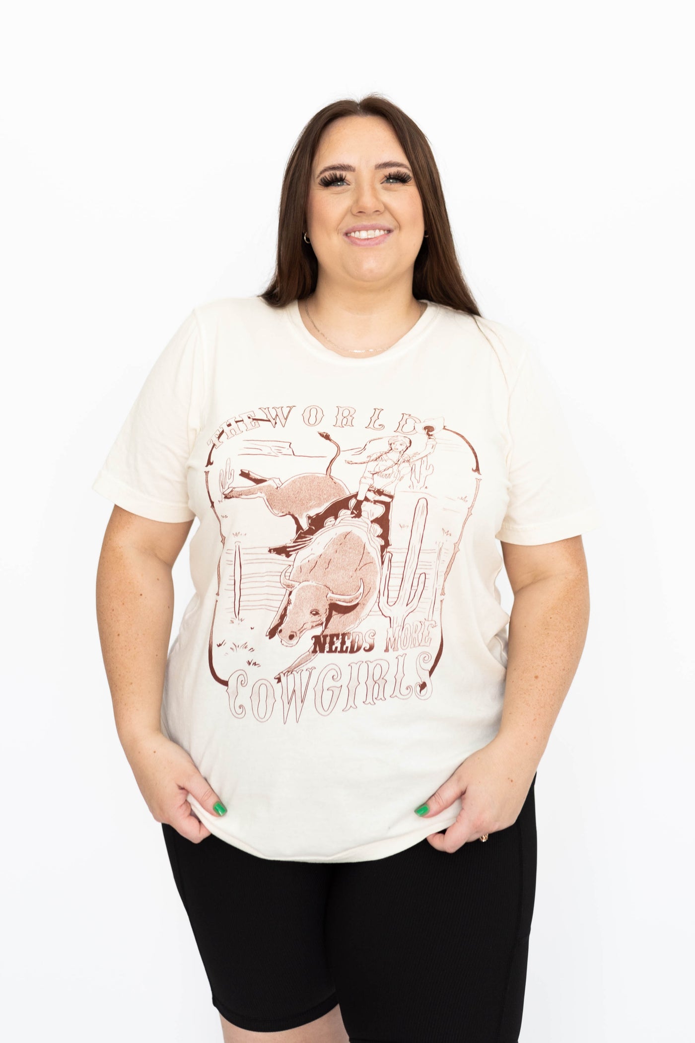 Front view of a plus size cowgirls cream tee