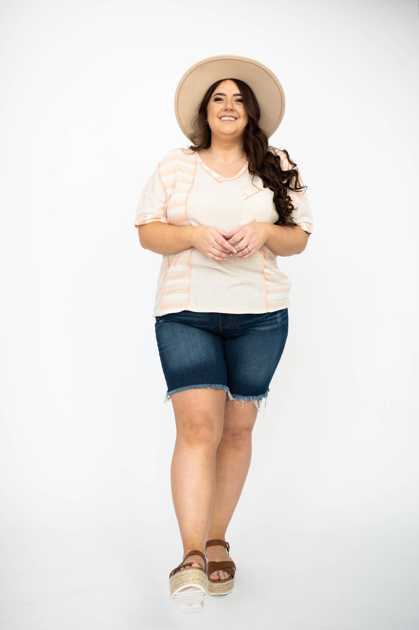 Plus size dark wash shorts with oatmeal top that are sold separately 