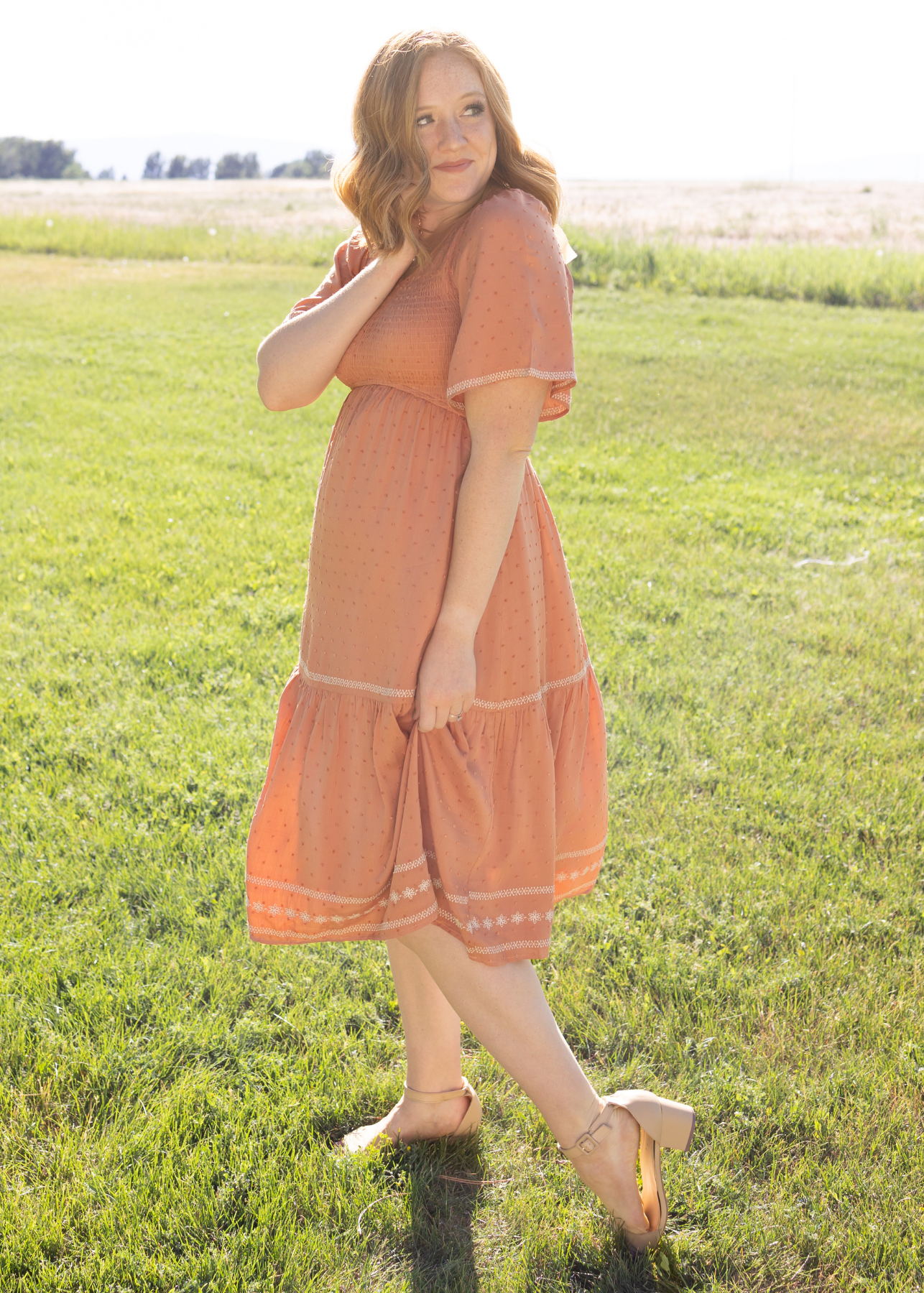 Side view of a terracotta dress