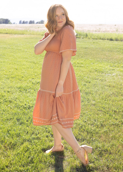 Side view of a terracotta dress
