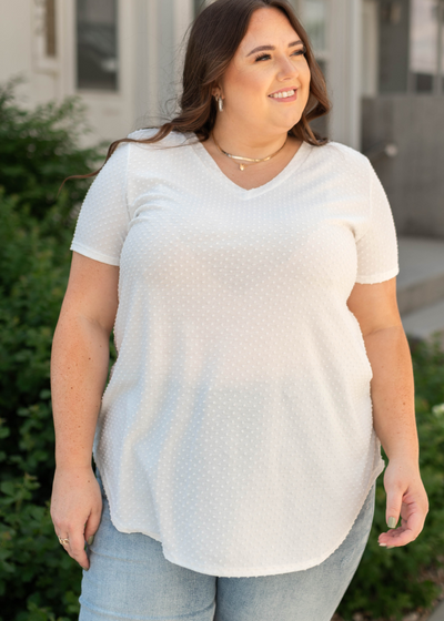 Front view of plus size white tee