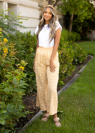 Yellow pants with plaid pattern