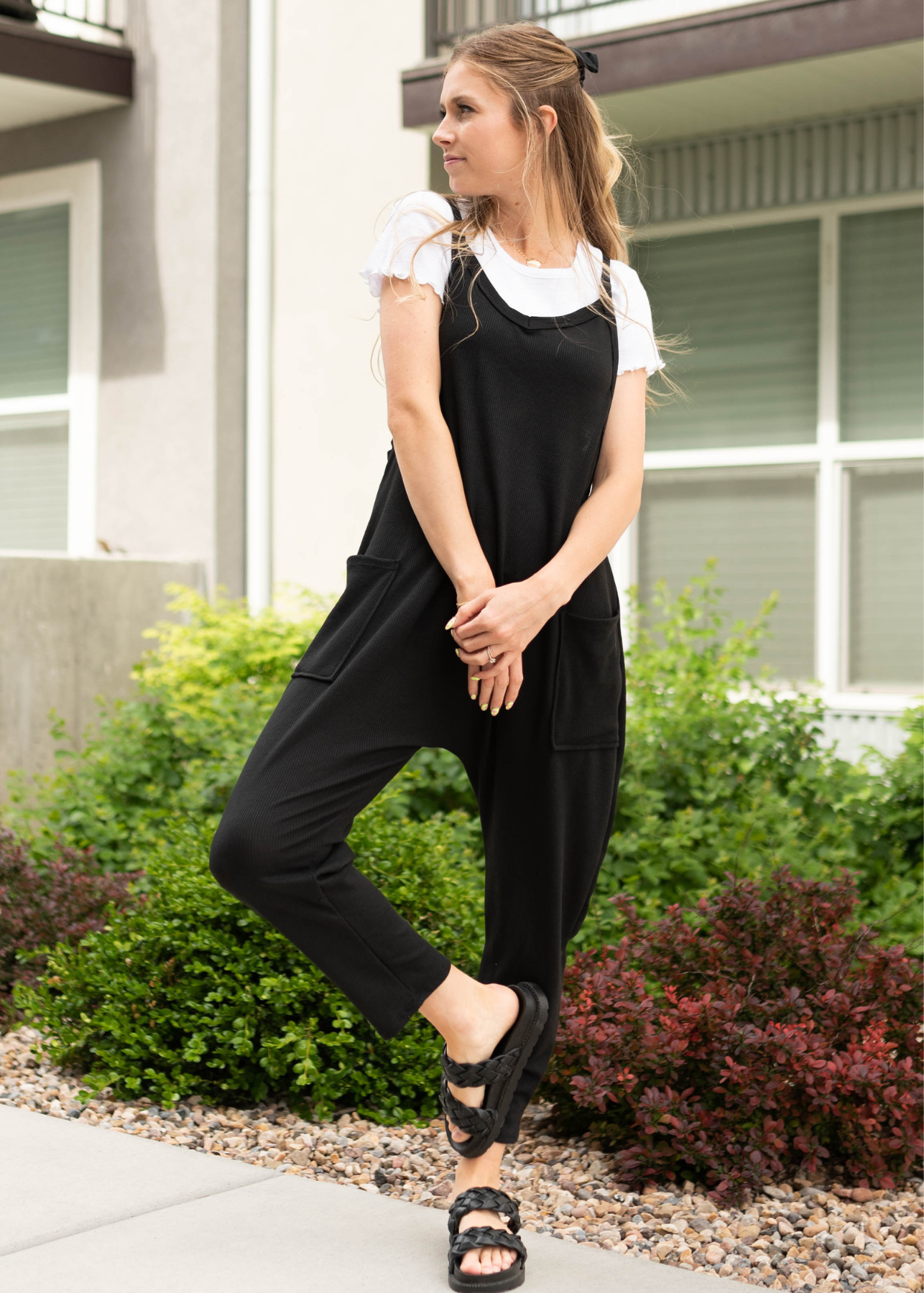 Knit black jumpsuit with pockets