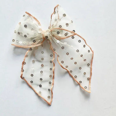 Elle Sheer Sequined Bow