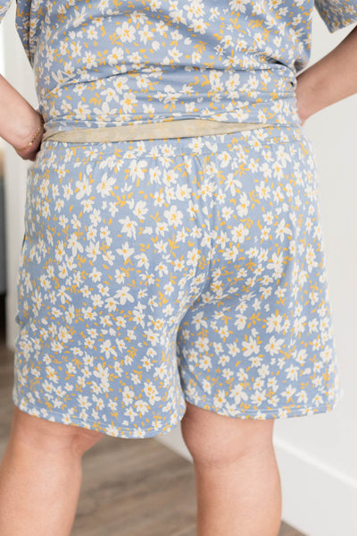 Back view of the plus size blue floral shorts