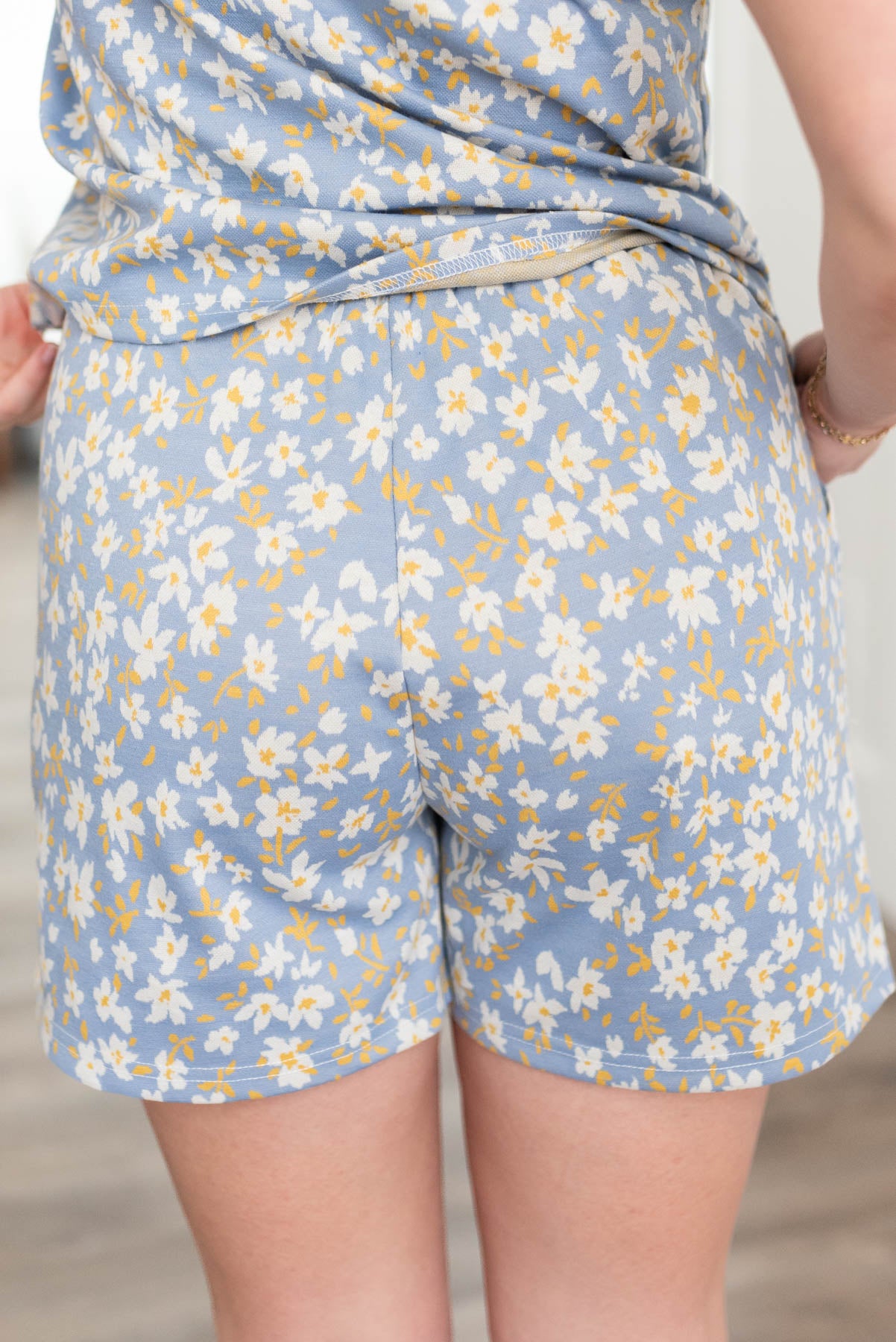 Back view of the blue floral shorts