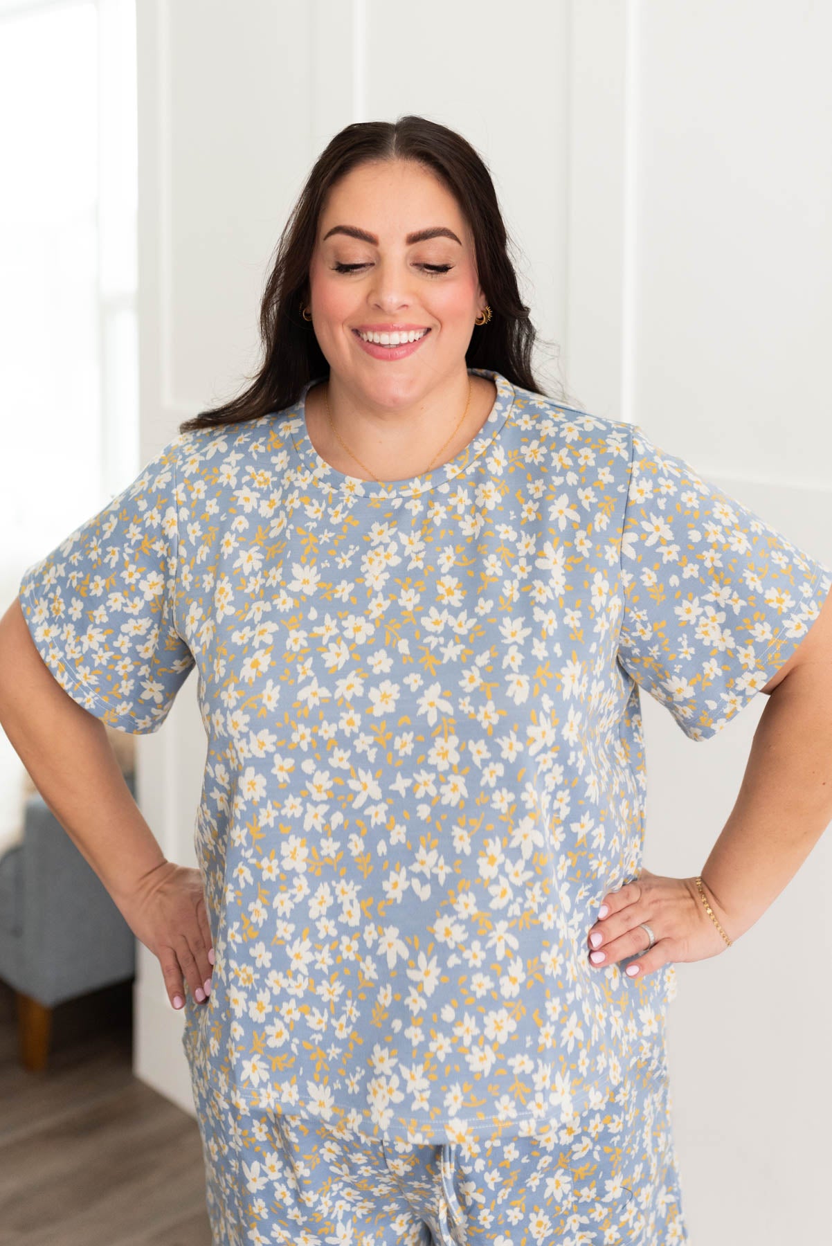 Front view of the plus size blue floral top