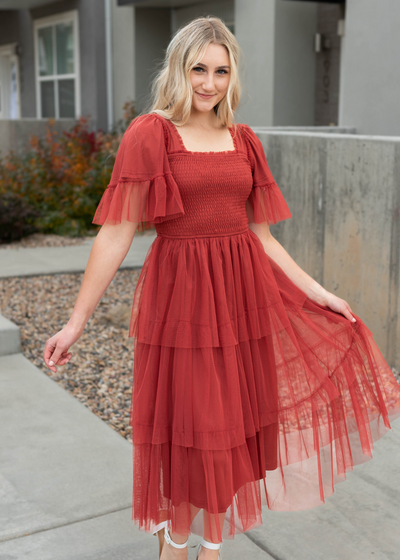 Rust mesh ruffle dress with ruffles on the sleeves