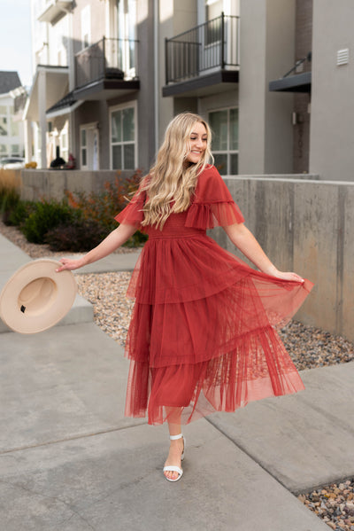 Rust ruffle mesh dress with short sleeves