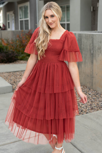 Rust ruffle mesh dress with smocked bodice