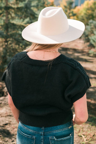 Back view of the black knit cardigan