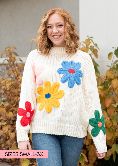 Cream flower sweater with bright flowers