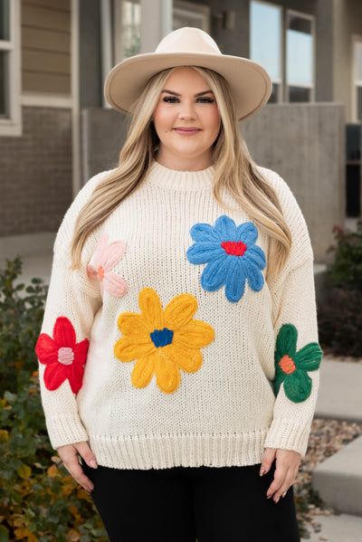 Bright flowers on the plus size cream flower sweater