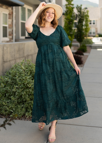 Emerald dress with a v-neck and short sleeves