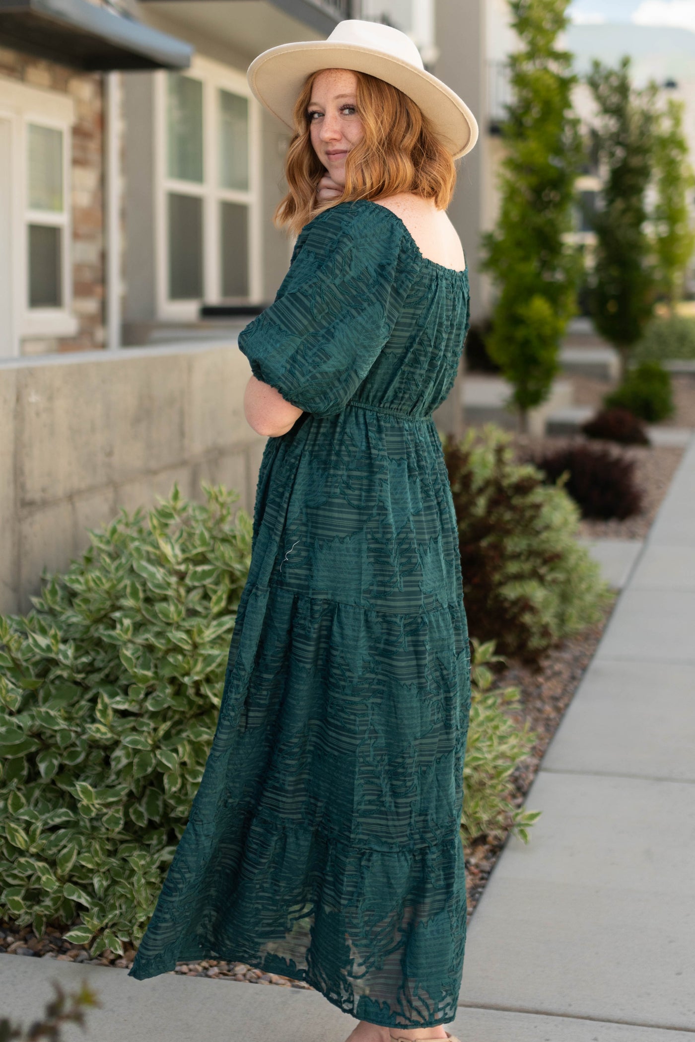 Side view of an emerald dress