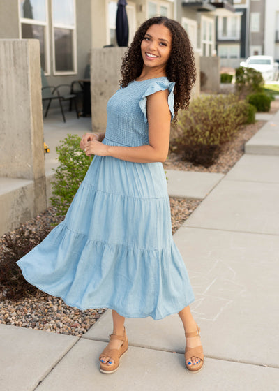 Chambray tiered dress with smocked bodice