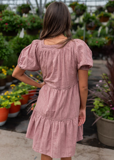 Back view of the dusty mauve embroidered dress