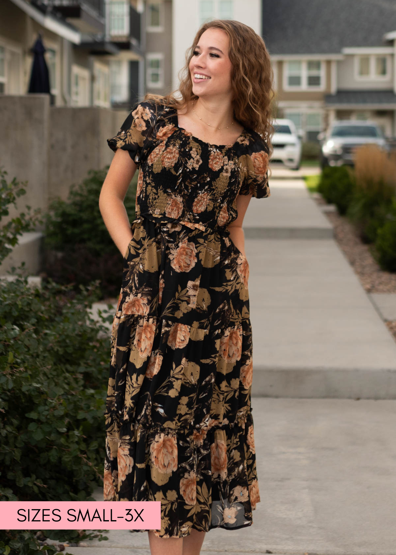 Black floral dress with square neck and short sleeves