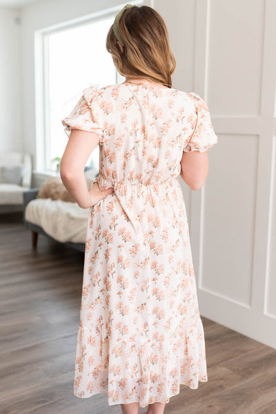 Back view of the cream floral dress