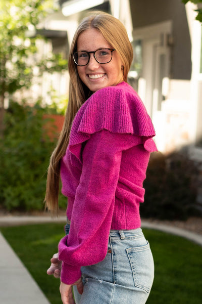 Side view of a magenta top