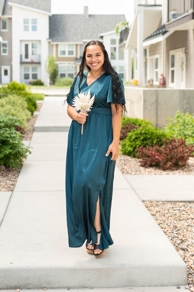 Deep teal dress with a v-neck