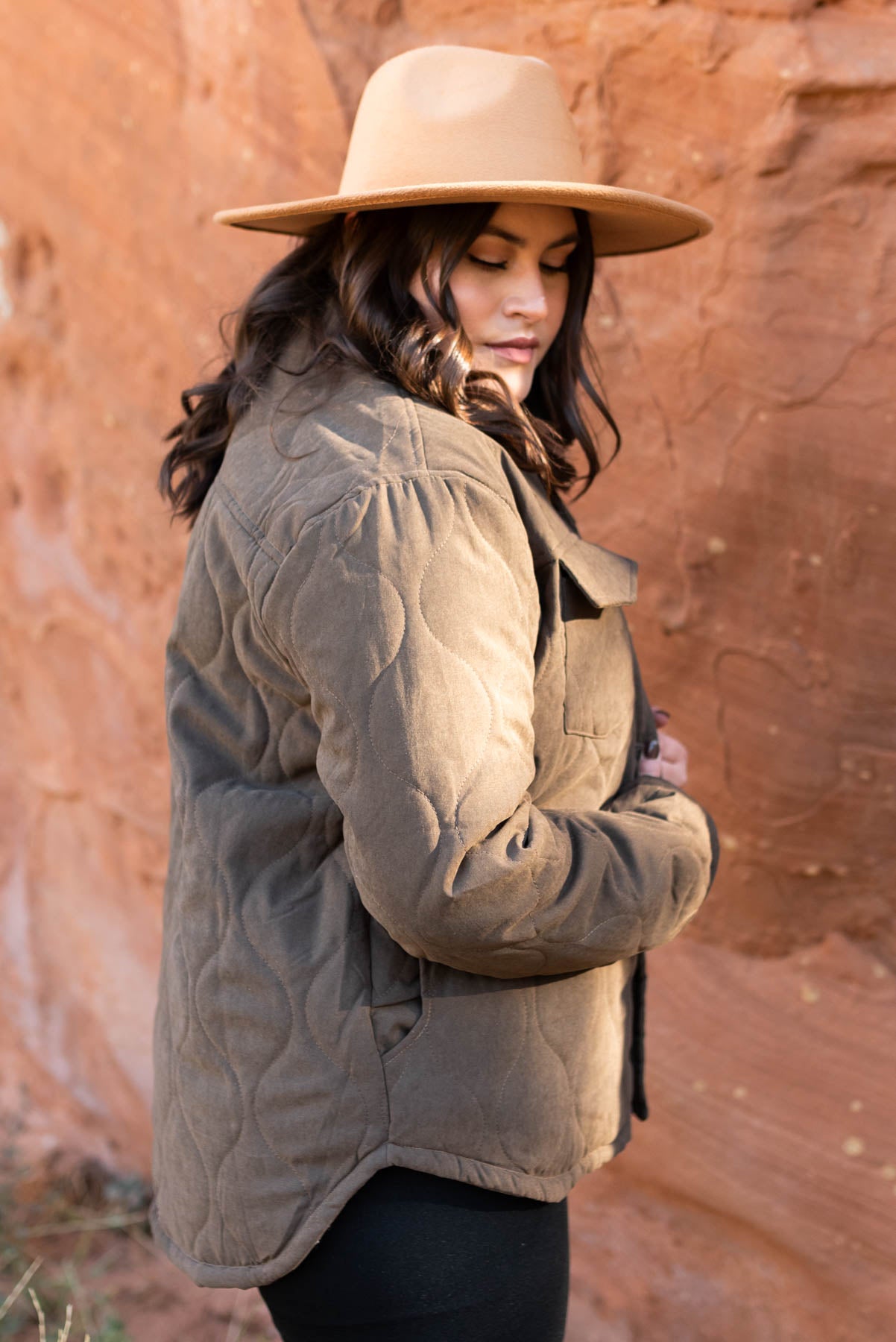 Side view of a plus size dark brown coat
