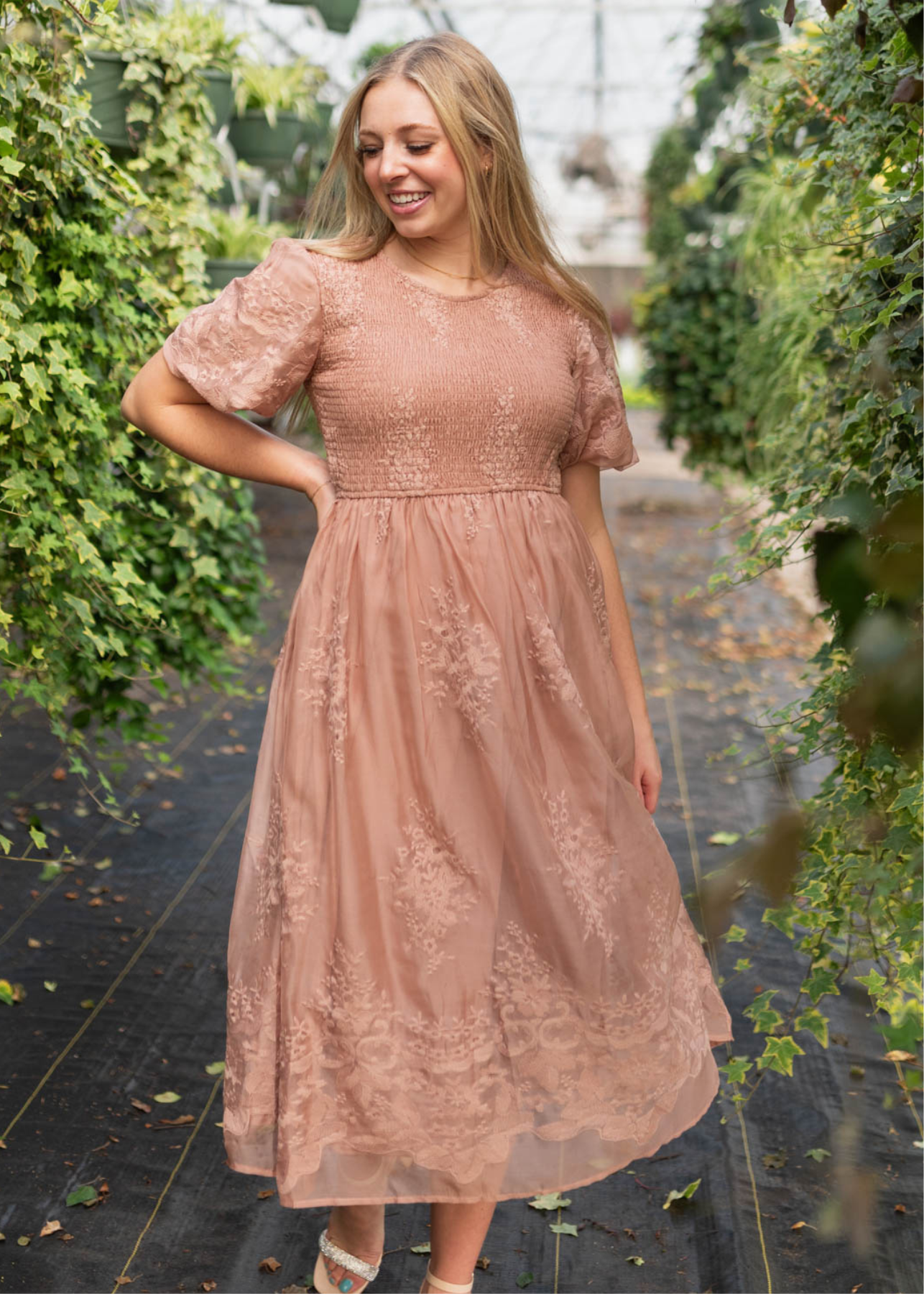 Dusty pink embroidered dress with short sleeves and smocked bodice