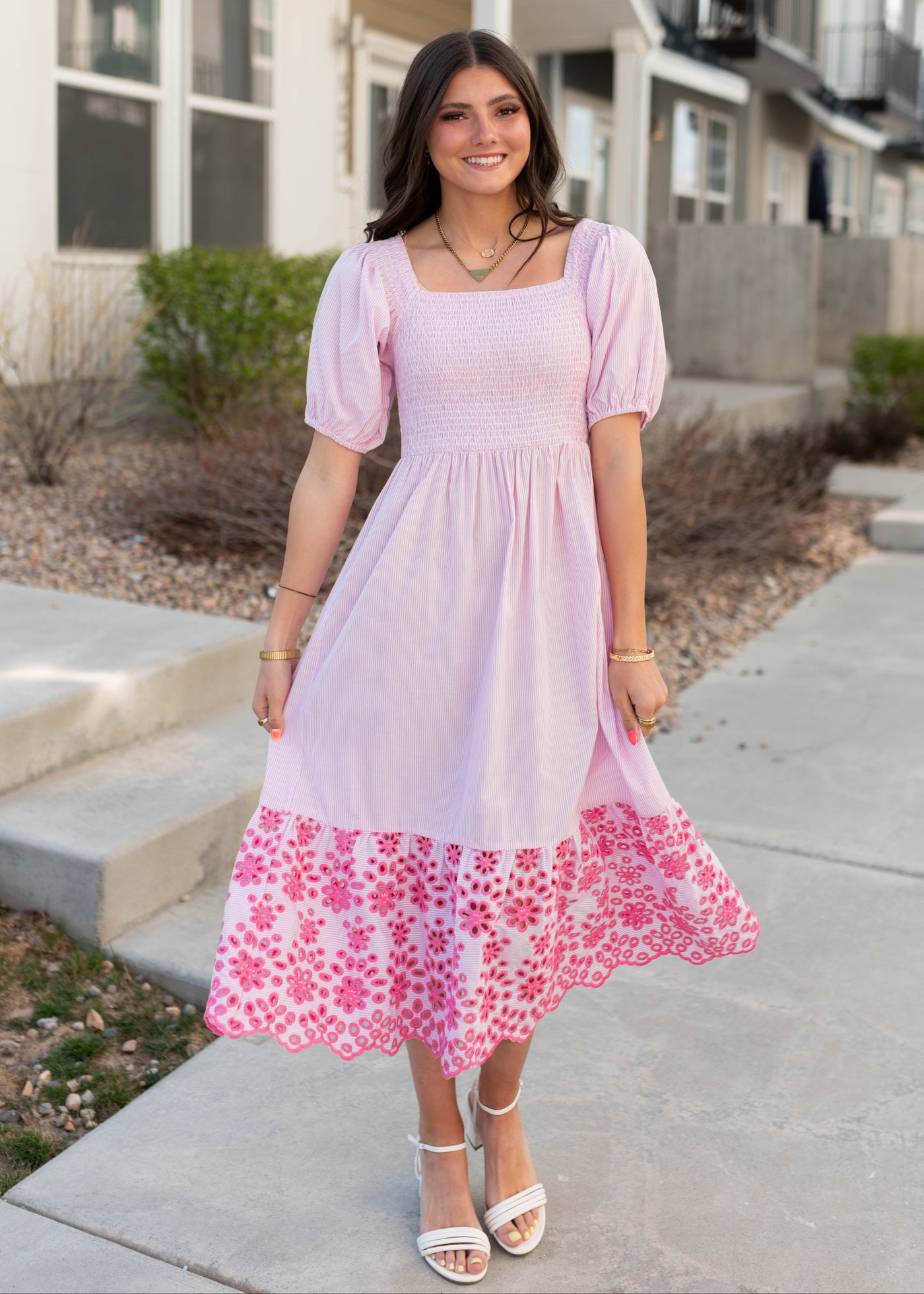 Smocked bodice on the pink stripe eyelet dress