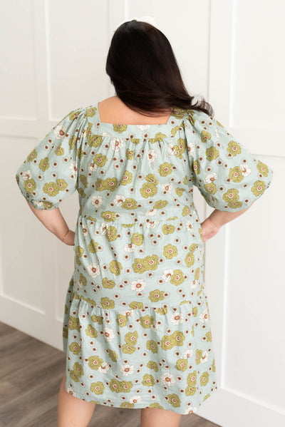 Back view of the plus size sage floral dress