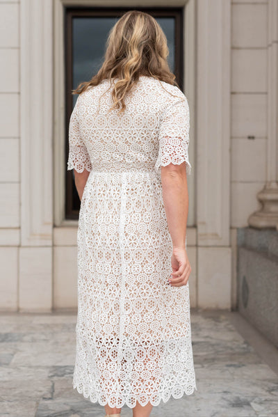 Back view of a ivory lace dress