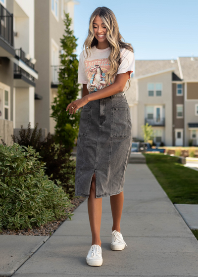 American cowboys pink tee with black skirt that is sold separately