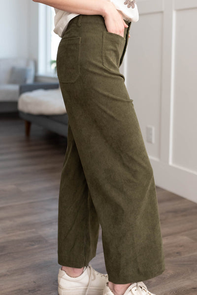 Side view of the olive corduroy pants