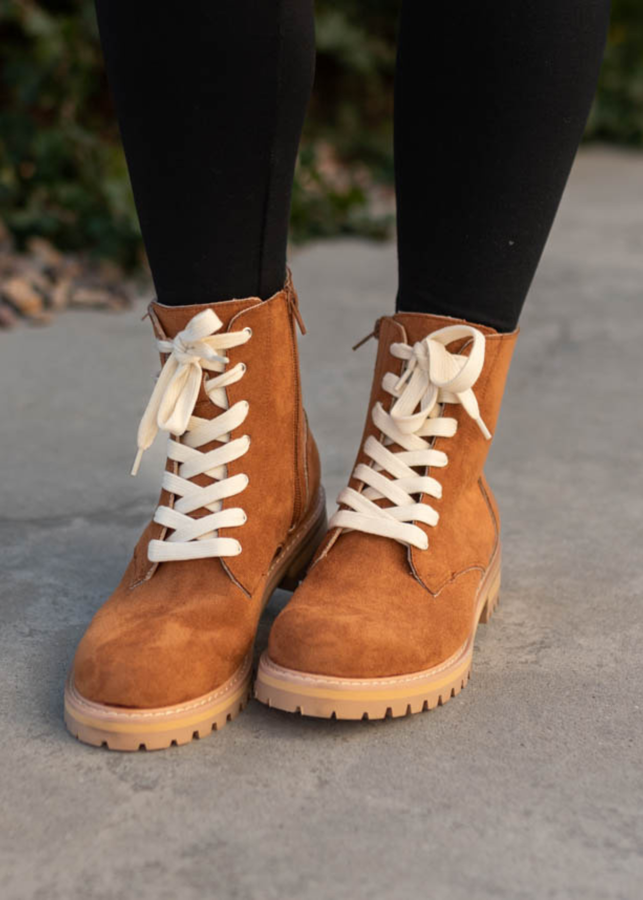 Camel lace up boots with zippers on the side