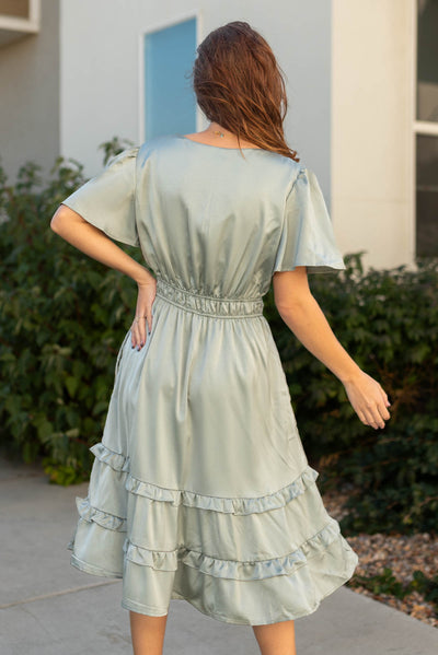 Back view of a dusty jade dress