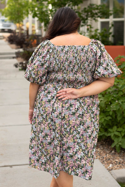 Back view of a plus size floral dress