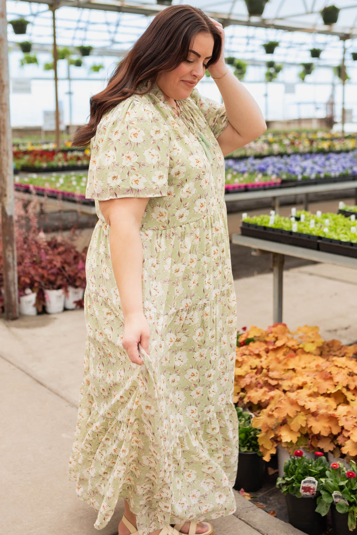 Side view of the plus size sage floral dress