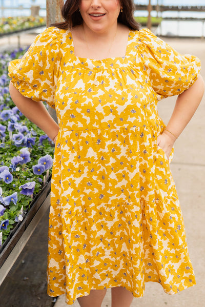Plus size mustard floral dress with a square neck