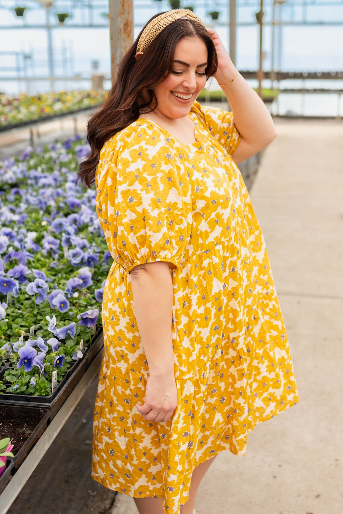 Side view of the plus size mustard floral dress