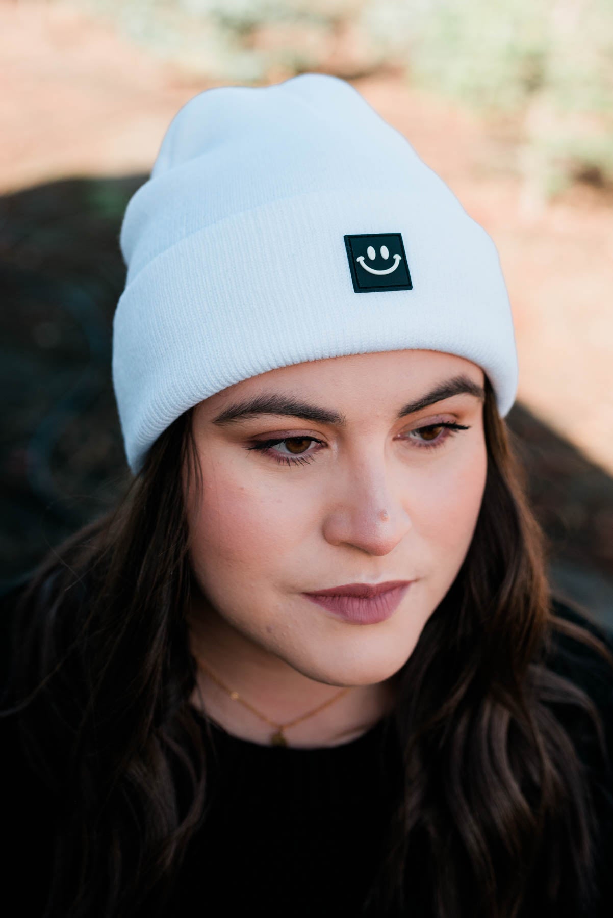 Front view of a smiley beanie
