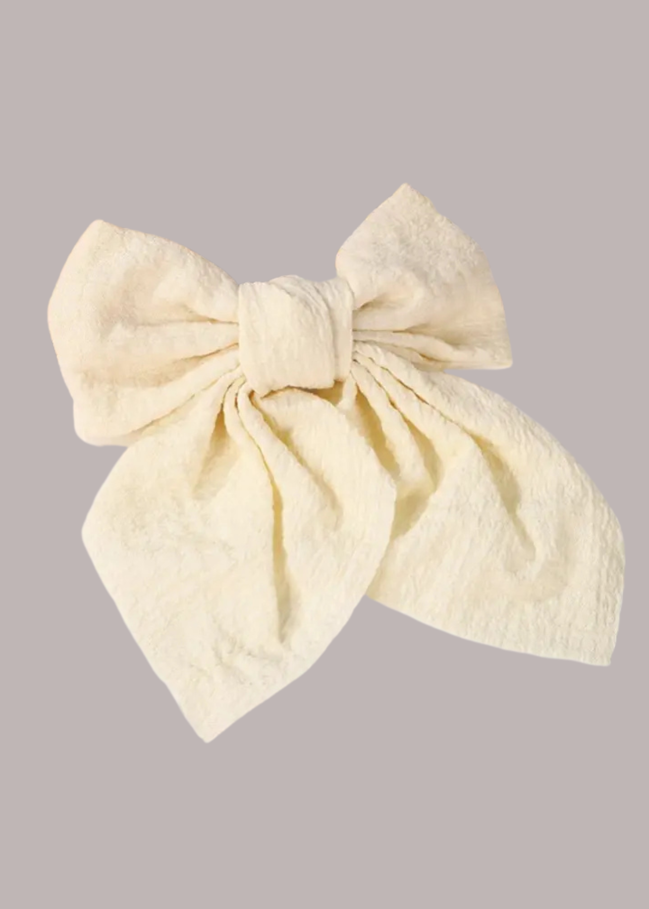 Textured cream bow