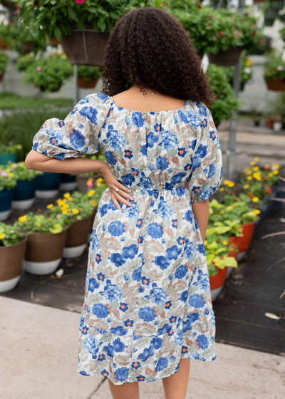 Back view of the blue floral dress